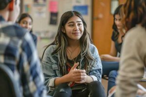 Group of teens learning anxiety coping skills together